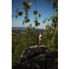 Senior man enjoying the outdoors, hiking, walking throught lovely nature