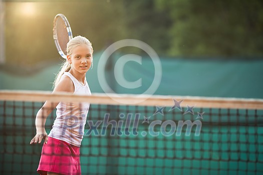 Portrait of a young, female tennis player Portrait of a young, female tennis player
