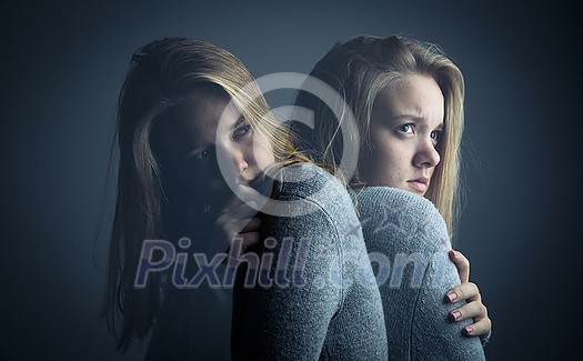 Young woman suffering from a severe stomach pain/depression/anxiety Young woman suffering from a severe stomach pain/depression/anxiety