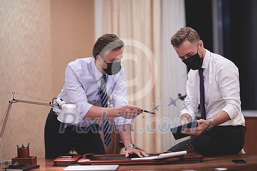 corporate business people team on meeting in luxury office wearing crona virus protection face mask keep social distance corporate business people team on meeting in luxury office wearing crona virus protection face mask keep social distance