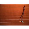 Shot of a young male athlete training on a race track. Sprinter running on athletics tracks seen from above