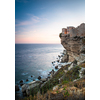 Sunset over the Old Town of Bonifacio, the limestone cliff, South Coast of Corsica Island, France