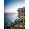 Sunset over the Old Town of Bonifacio, the limestone cliff, South Coast of Corsica Island, France