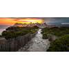 Sunset and storm over the Old Town of Bonifacio, the limestone cliff, South Coast of Corsica Island, France