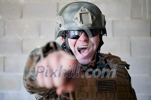 angry soldier pointing with finger and screaming angry soldier pointing with finger and screaming