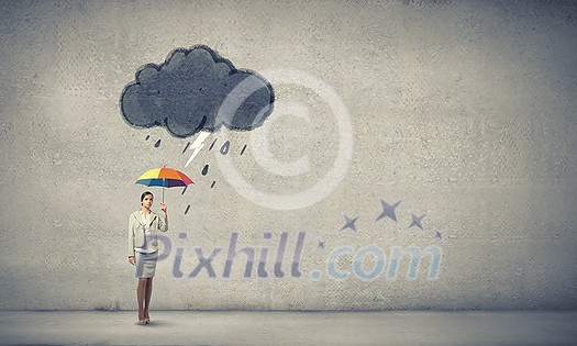Young businesswoman with colorful umbrella under black cloud Young businesswoman with colorful umbrella under black cloud
