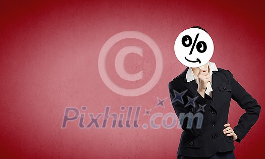 Unrecognizable businesswoman hiding her face behind mask