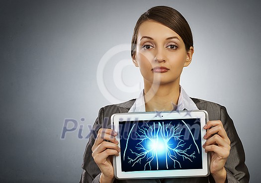 Woman holding tablet pc with lungs xray concept
