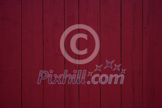tradidional wooden wall of a red house in Norway abstract background