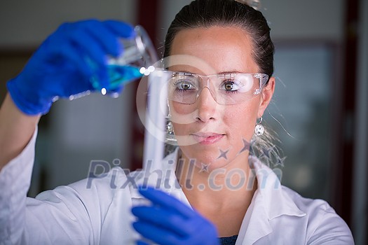 Female researcher carrying out scientific research in a lab (shallow DOF; color toned image) Female researcher carrying out scientific research in a lab (shallow DOF; color toned image)