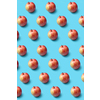 Vertical creative fruits pattern from freshly picked ripe natural organic apples on a blue background. Vegetarian concept.
