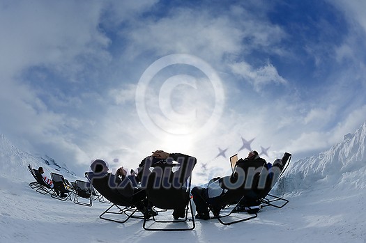 happy people group have fun on snow at winter season on mountain with blue sky and fresh air happy people group have fun on snow at winter season on mountain with blue sky and fresh air