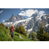 Pretty, female hiker/climber in a lovely alpine setting of Swiss Alps