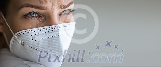Young woman wearing a face mask during coronavirus and flu outbreak. Virus and illness protection, home quarantine. COVID-19 concept