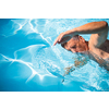 Senior man in his home swimming pool, enjoying the deserved retirement