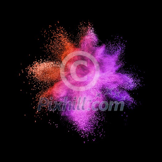 Creative chaotic powder explosion or burst in red and purple colors on a black background with copy space.