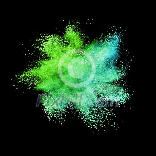 Decorative chaotic multicolored powder burst or explosion on a black background with copy space. Decorative chaotic multicolored powder burst or explosion on a black background with copy space.