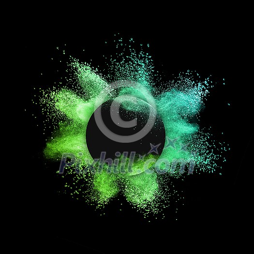 Abstract crative round frame with colorful powder or dust explosion on a black background, copy space. Abstract crative round frame with colorful powder or dust explosion on a black background, copy space.
