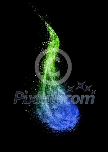 Creative powder splash or explosion in blue and green colors in the shape of curved cloud on a black background with copy space. Creative powder splash or explosion in blue and green colors in the shape of curved cloud on a black background with copy space.