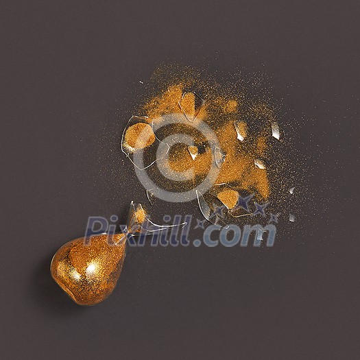 Top view of cracked old-fasioned vintage sandglass with bits of glass and golden sand on a black background with soft shadows, copy space.