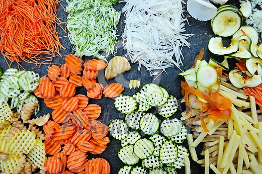 fresh healthy organic food mixed vegetables slice on black background