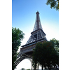 Eiffel Tower in Paris against a dramatic blue sky at day tourist and travel attraction