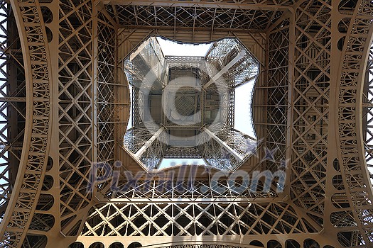 Eiffel Tower in Paris against a dramatic blue sky at day tourist and travel attraction Eiffel Tower in Paris against a dramatic blue sky at day tourist and travel attraction