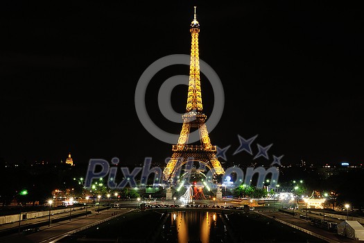 eiffet tower in paris at night tourist and travel icon and attraction eiffet tower in paris at night tourist and travel icon and attraction