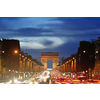 Beautiful night view with car traffic and rush at eavning of the Arc de Triomphe, Paris, France.