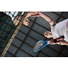 young girls playing tennis game indoori in tennis court