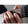 Close up of male hands playing electric guitar