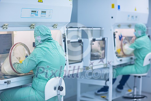 Pharmaceutical industry factory and production laboratory (color toned image; shallow DOF), COVID vaccine production concept
