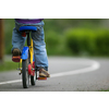 Little cyclist on a little bike (shallow DOF)