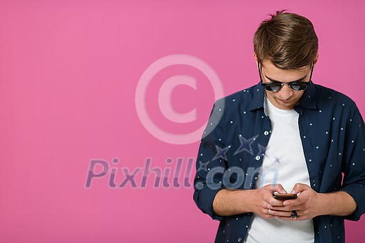 a portrait of a young man wearing a blue shirt and sunglasses using a smartphone with different facial expressions