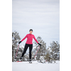 Cross-country skiing: young woman cross-country skiing on a winter day