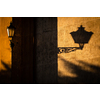 Old lantern in warm evening light in an old downtown street