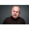 Senior man lonely at home, anxious/afraid to go out - self isolation/ quarantine due to COVID-19/ Coronavirus social distancing/prevention concept