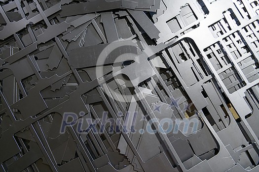 parts of the waste after processing on a laser CNC machine. scrap metal. metal residues after laser cutting. High quality photo parts of the waste after processing on a laser CNC machine. scrap metal. metal residues after laser cutting. High quality photo