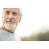 Portrait of a senior man outdoors, against the sky - optimism, good health, happyness radiates of the man's face, expression