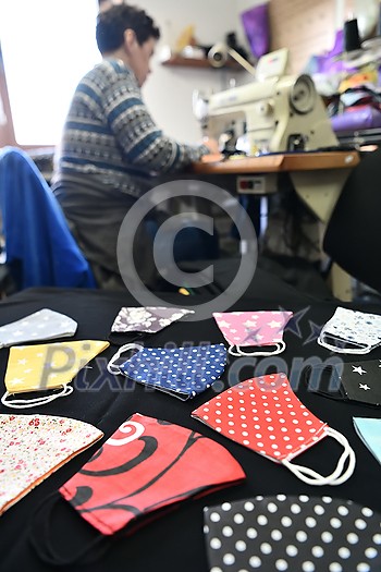 Homemade Manufacturing Of Protective Trendy Medical Face Mask. Tailor Woman Sewing With Machine At Home, Healthcare New Normal Concept In Coronavirus Covid19 Lockdown