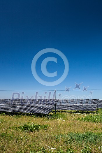 Sunlight as a resource of renewable energy: solar panels on a sunny day