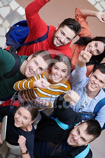 top view of happy young group of people showing their unity top view of happy young group of people showing their unity