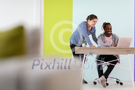 an african american and a young girl plan meetings together and use a laptop for an online meeting
an african american and a young girl plan meetings together and use a laptop for an online meeting