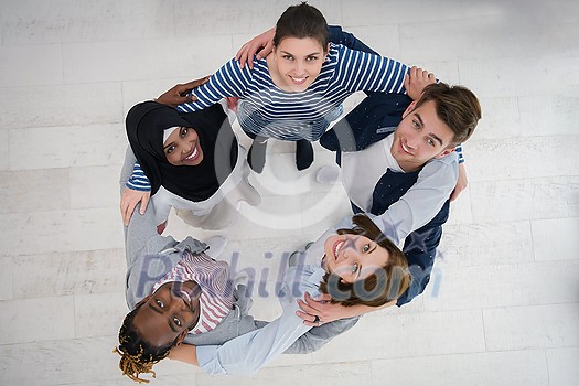 a top view of  diverse group of people standing embracing and symbolizing togetherness
