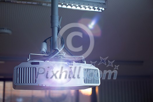 Modern laser projector in a conference room . LCD Projector technology video presentation Modern laser projector in a conference room . LCD Projector technology video presentation