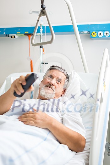 Senior male patient in a modern hospital (shallow DOF; color toned image) Senior male patient in a modern hospital (shallow DOF; color toned image)
