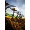 Tractor working on the farm, modern agricultural transport, farmer working in the field, tractor on a sunset background, cultivation of land, agricultural machine