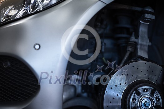 Tyre change - wheel balancing or repair and change car tire at auto service garage or workshop by mechanic Tyre change - wheel balancing or repair and change car tire at auto service garage or workshop by mechanic