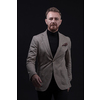 Confident businessman walking forward wearing a causal suit, handsome senior business man hero shot portrait isolated on black. High quality photo