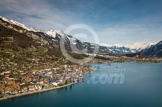 The crystal clear blue water of Lake Brienz in the Swiss Alps - Switzerland from above The crystal clear blue water of Lake Brienz in the Swiss Alps - Switzerland from above